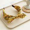 A New Autumn and Winter Style Cashew Flower Rabbit Ear Wide Headband for a Woman Pressing Her Hair Band Into a Knot