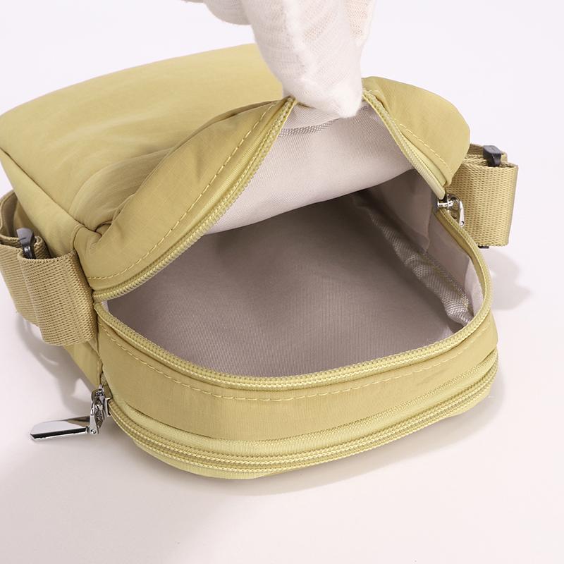 Lightweight Nylon Crossbody Bag with Front Flap Snap Closure Casual Mini Shoulder Purse for Daily Travel