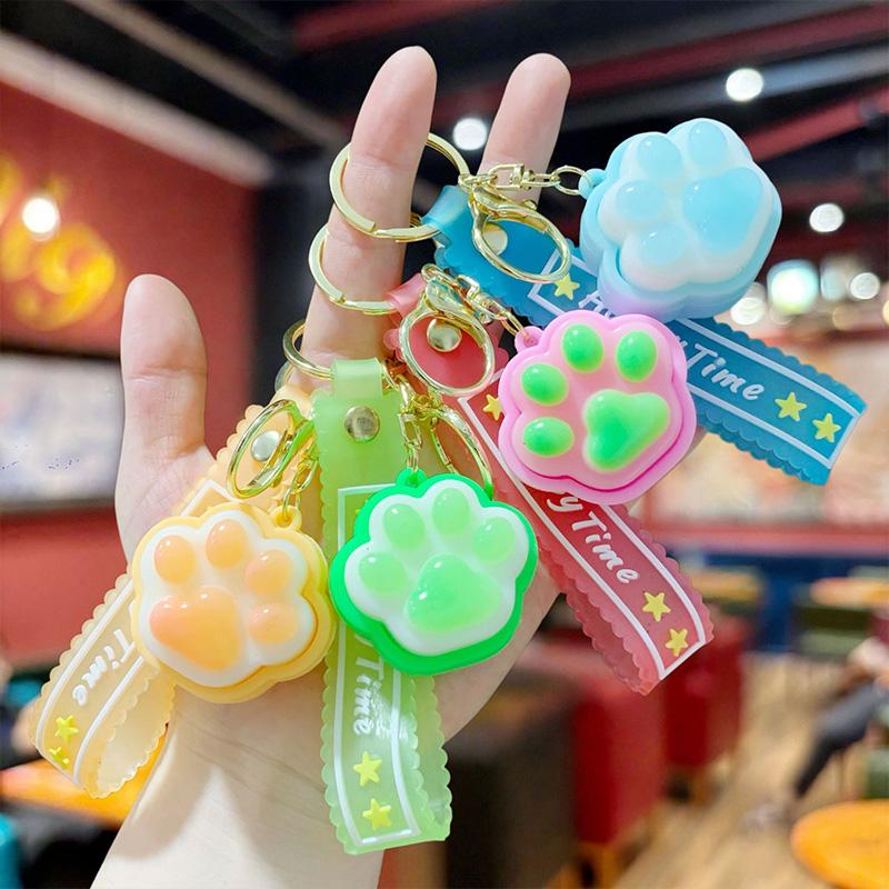 Cat Paw Glowing Keyboard Keychain Soft Dumpling Clicker Keyring Stress Relief Squeeze Pendant Fidgets Toys Glowing In The Dark