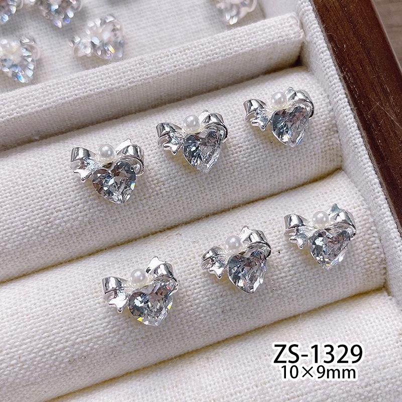 

Циркон Нагроможденный Бриллиант Нейл-арт Ювелирные изделия: Ледяной Прозрачный Белый Голубиное Яйцо Ручная Вставка Жемчуг Роза Цветок со Сверхблестящими Стразами для Нейл-арта