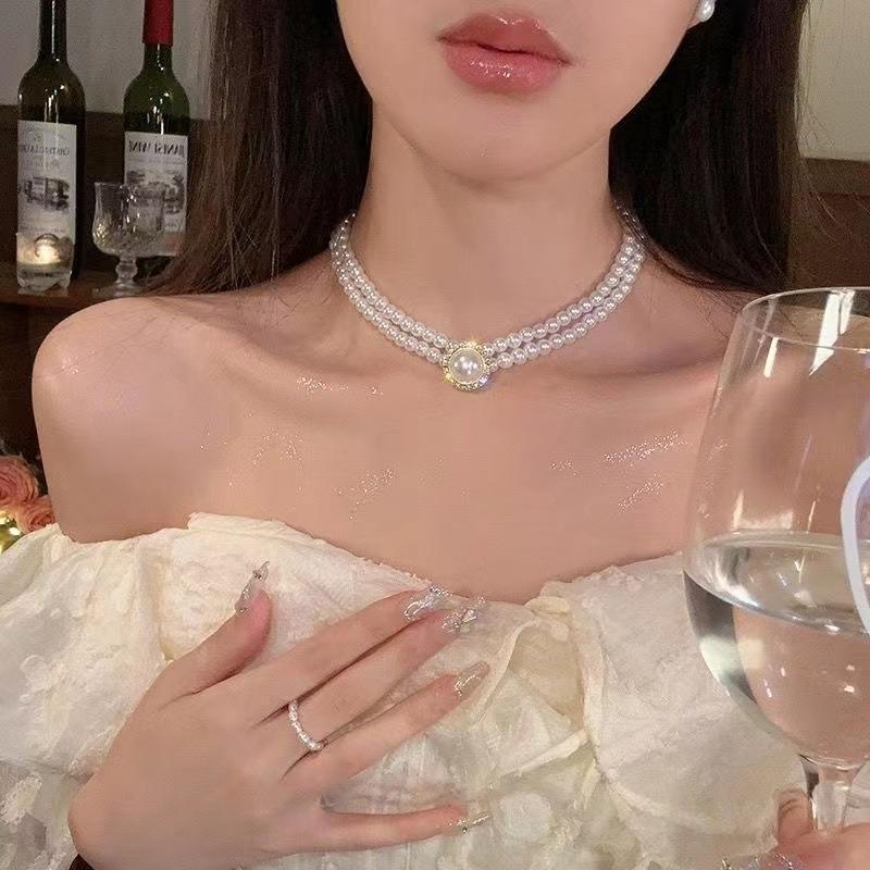 Real gold electroplated pearl and diamond-inlaid floral necklace, niche, fashionable, versatile collarbone chain, elegant and high-end accessory