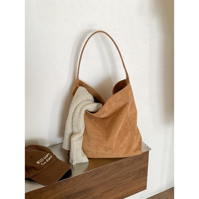 

Осень и зима новая замшевая сумка ленивый ветер повседневная сумка на плечо нишевый пригородный ветер большая вместимость сумка-тоут женщины абрикосовый