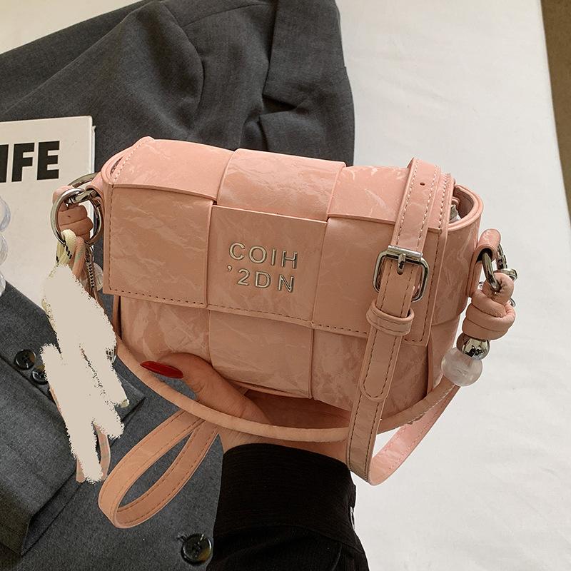 Spring and summer hot sale versatile high-end woven grid portable small square bag Korean version casual fashion commuter messenger women's bag