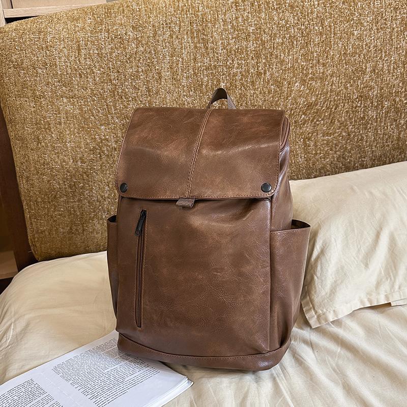 Retro Hong Kong style PU soft leather texture backpack men's large-capacity American schoolbag female college student computer backpack waterproof