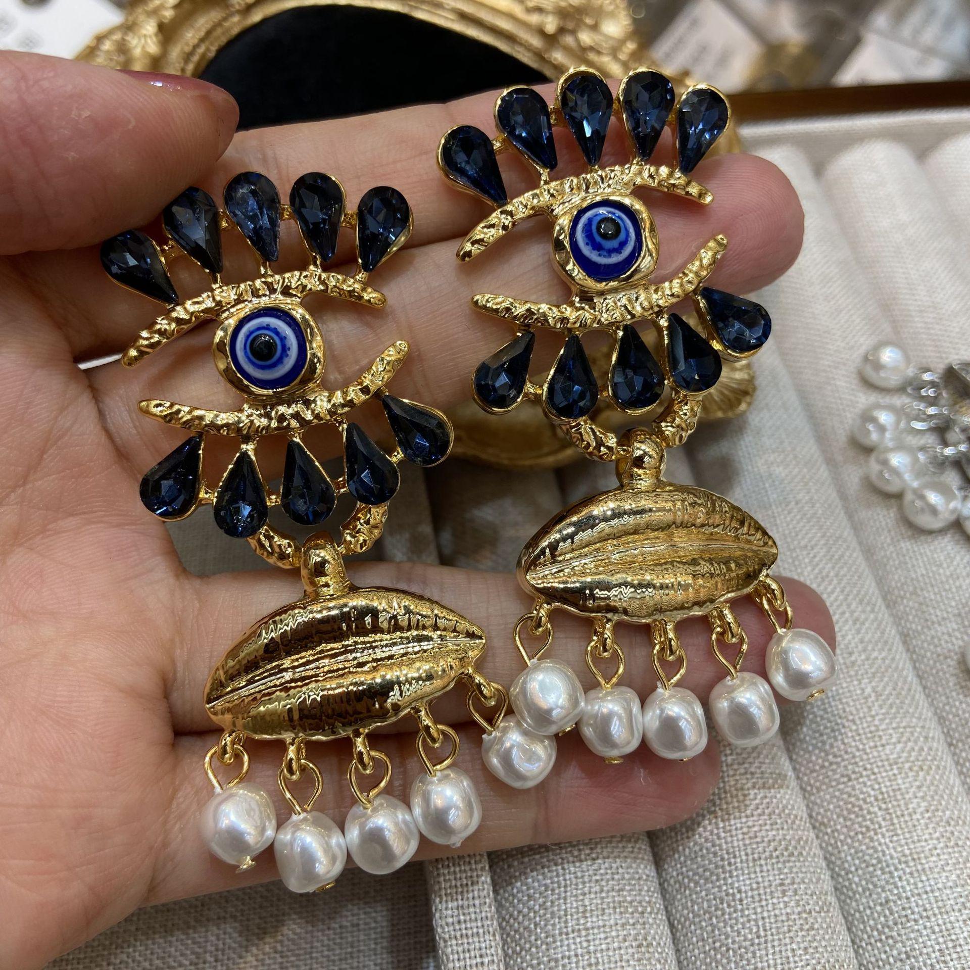 

Винтажные серьги-пусеты с западным тотемом: Европейская и американская мода с дизайном в форме глаза