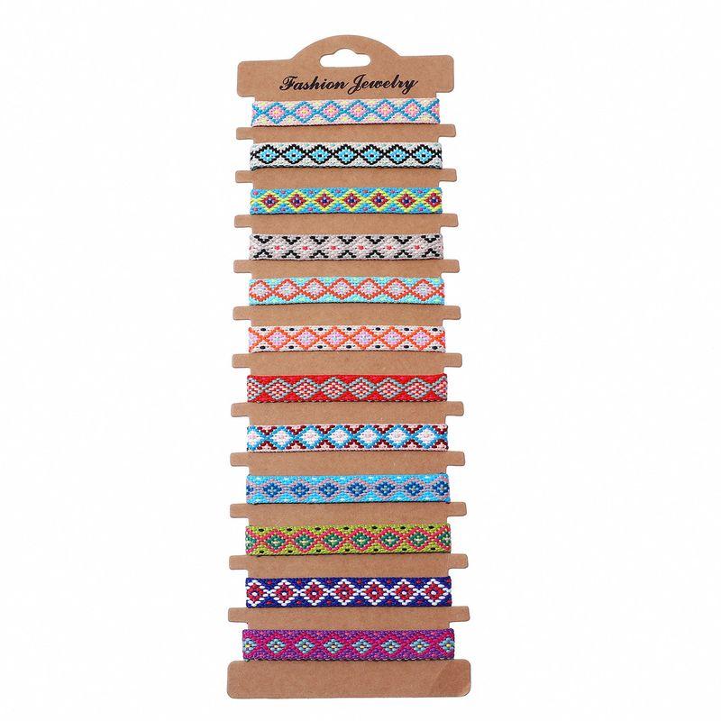 

Cross-Border Fashion Bohemia Style Woven Friendship Bracelet Female Factory in Stock Ethnic Style Nepal Carrying Strap Suit 10cm B4038--A