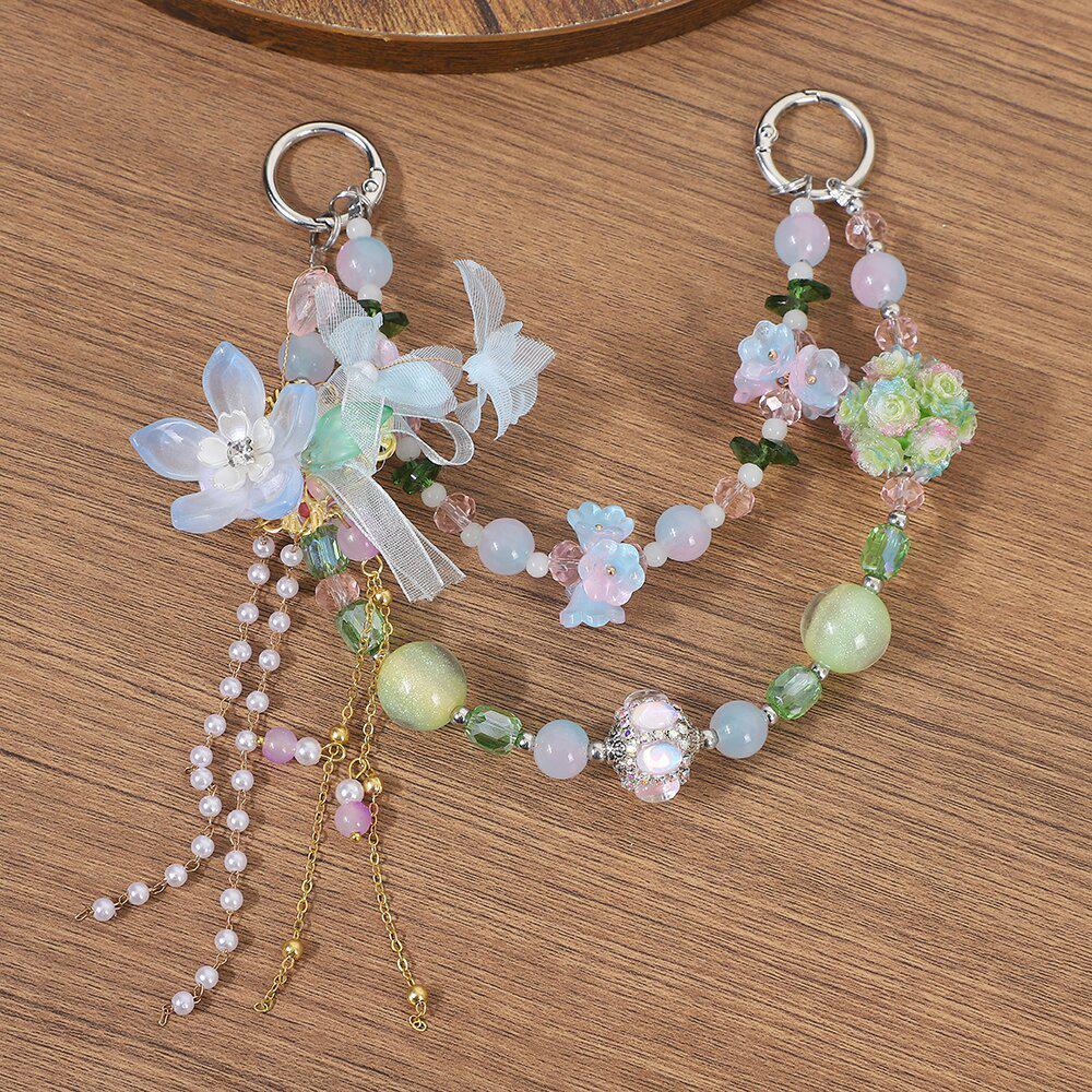 

Стеклянная цепочка на телефон Лотос : Шнурок-брелок в китайском стиле с бусинами в виде бабочек и ремешком от потери для сумки.