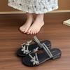 Beautiful flat-bottomed slippers women's summer wear 2025 new Internet celebrity explosion butterfly rhinestone with skirt two wear sandals
