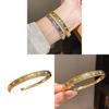 Bracciale in Zirconio Placcato Oro Stile Retrò con Design Geometrico per Eleganti Accessori da Donna