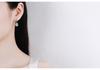 Emerald Cut Moissanite Stud Earrings In Platinum-Plated S925 Sterling Silver