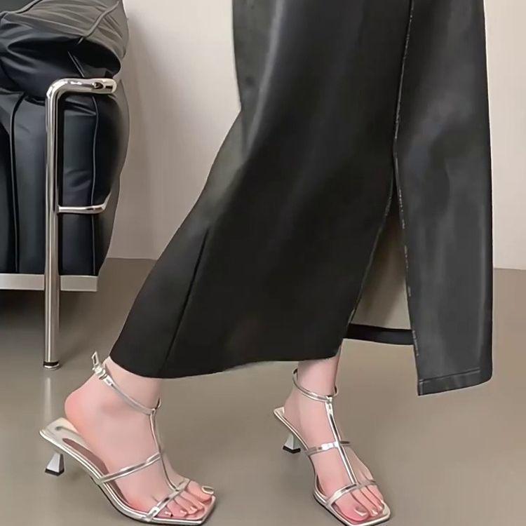 

Beautiful one-word thin belt open-toed Roman shoes women s 2025 new super foreign style holiday style fine heel high heel sandals 40 серебряный