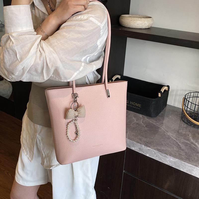 

Retro Lychee Grain Tote Bag: Versatile Crossbody Handbag for Women – Perfect for Commuting and Casual Use розовый