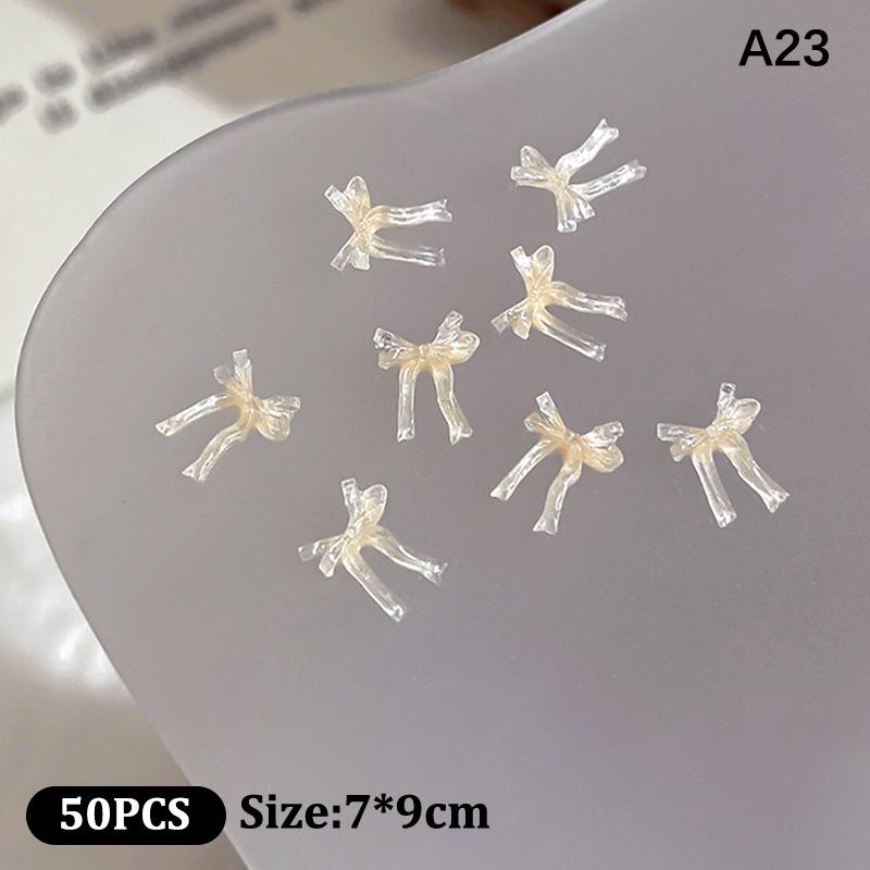 50Pcs Ice Transparent Color Bowknots Resin Nail Art Decorations 3D Mini Cute Bows Nail Charms For Diy Nails Accessories