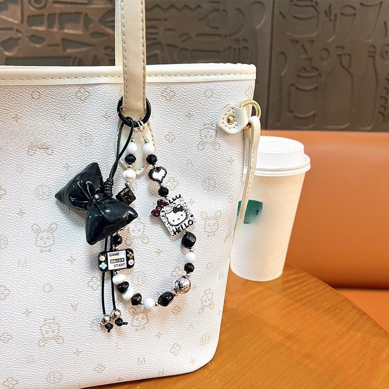 Creative new cat bow beaded mobile phone chain keychain exquisite cute bag pendant small gift wholesale