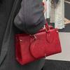 High-end handheld small square bag women's 2025 new retro fashion shoulder bag niche design commuter crossbody bag for women