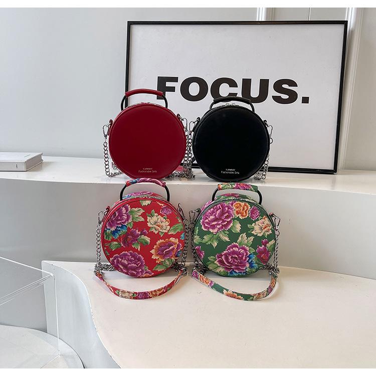 Damen-Sommertasche, großes Blumen- und kleines rundes Design.