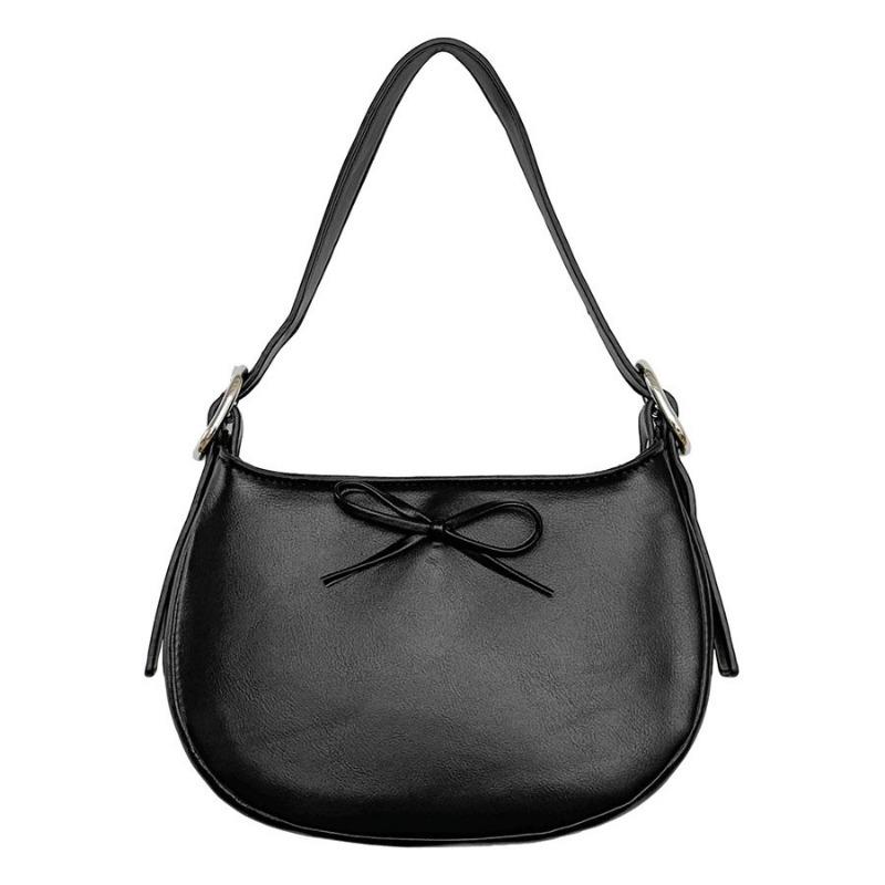 Niche style underarm bag women's oval simple small handbag fashion bow spring and summer new shoulder bag women