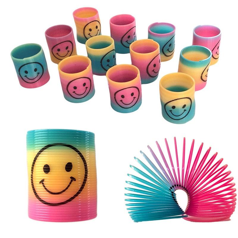 12x Mini Slinky Smiley Face Springs Rainbow Smiley Face Spring Party Bag výplně plastové