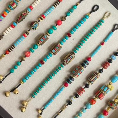 Bestseller Tibetisches Ethnisches Multi-Schatz-Armband: Trendiger, vielseitiger Retro-Webstil für Damen