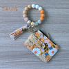 Ladies Floral Wristlet Wallet Boho Style Coin Purse Keychain with Tassel Elastic Beaded Wristlet Wallet with ID Card Window for Shopping Travel Daily