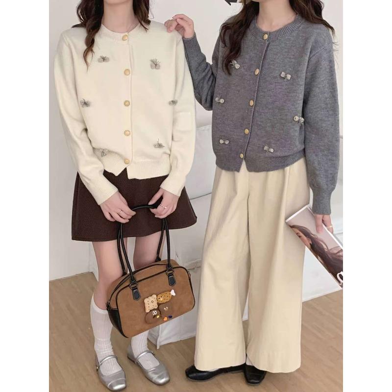 

Age-reducing casual versatile knitted cardigan women s autumn and winter new gentle wind temperament elegant soft waxy sweater One size темно-серого