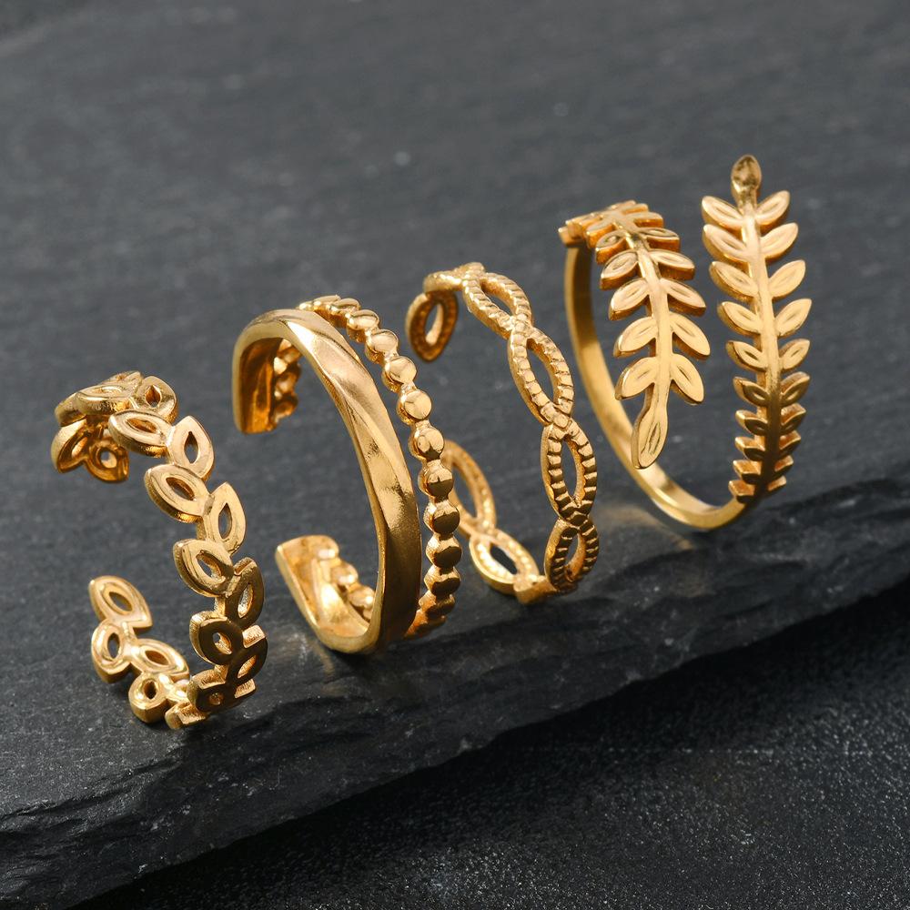 

Новые украшения из титановой стали, кольцо на указательный палец с полым узором в виде пшеничного колоса, под давлением масла, модный дизайн, набор из четырех колец из нержавеющей стали Average Size золотой
