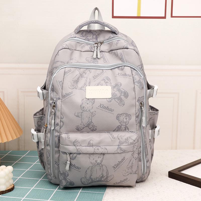 Simple travel computer backpack casual solid color bear shoulders junior high school students large capacity student bag schoolbag