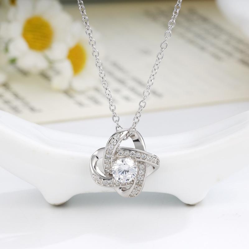 Sterling Silver S925 Rotating Four-Leaf Clover Necklace with Electroplated Full Diamond Petal Design 925 Sterling Silver