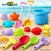 Complete Beach Toy Set: Includes Shovel, Wheelbarrow, Bucket, and Water Toys for Kids' Sand Play at the Seaside.