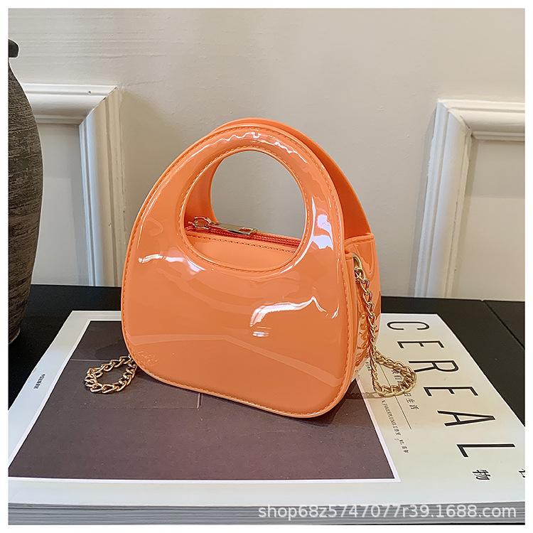 2025 new personalized glossy dinner bag women's bag fashion creative go out solid color handbag diagonal span wrist bag trendy bag