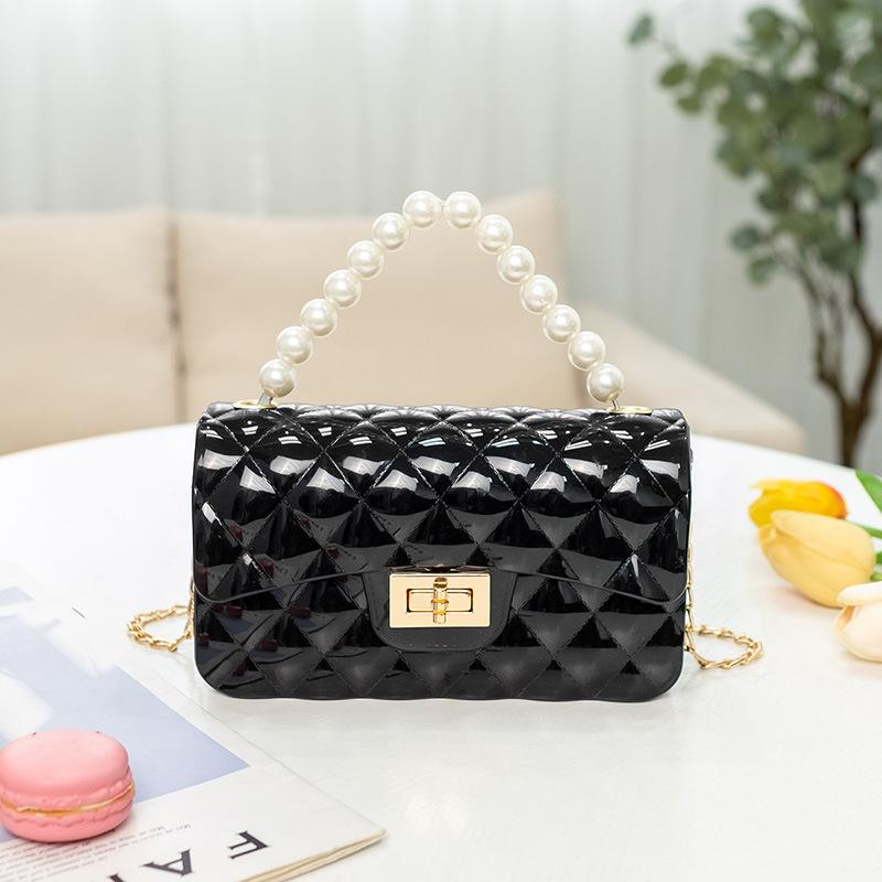 Fashion pearl shoulder jelly bag, women's versatile diamond lipstick change bag, one piece.