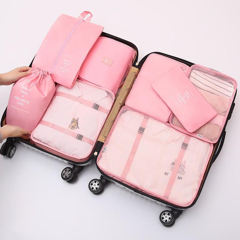 Eight-Piece Travel Organizer Set: Storage Bags & Makeup Bag for Clothes and Accessories.