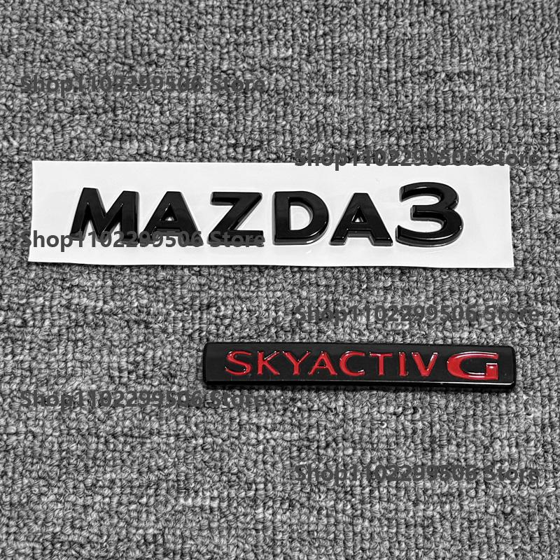 Glossy Black ABS Car Front Grille Eemblem Rear Trunk Badge Replace Stickers SKYACTIV GX For 2019-2025 Mazda 3 Logo Accessories