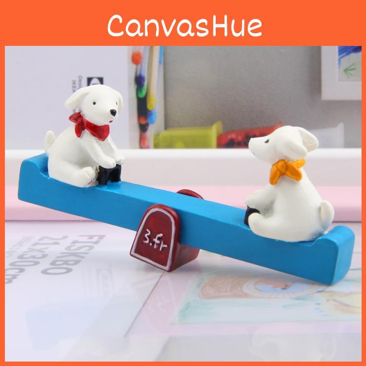 Garden Planting Prop Resin Dog Seesaw Figure With Cartoon Design For Gift And Promotional Use