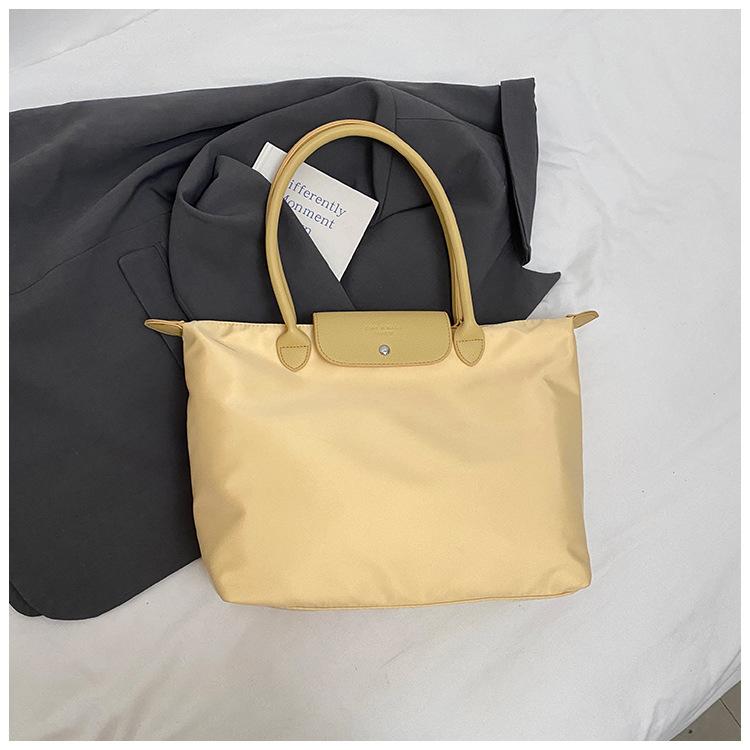 

2025 spring dumpling bag tote bag versatile women s handbag shoulder messenger bag commuter women s bag large capacity bag жёлтый