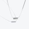 Rush Off Surgical Steel Daily Cylinder Pendant Necklace