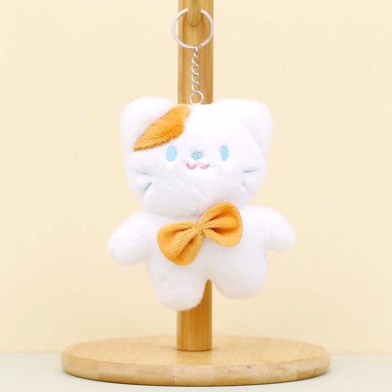 

Adorable Plush Cat Keychain Toy Soft And Cuddly Cartoon Cat With Bow 12 Cm Brown Bow Cat