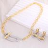 Trendy Hip-Hop Jewelry Set: Copper Zircon Pig Nose Necklace, Earrings, Ring, and Bracelet