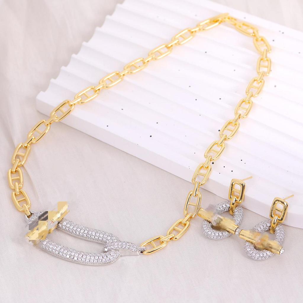 Trendy Hip-Hop Jewelry Set: Copper Zircon Pig Nose Necklace, Earrings, Ring, and Bracelet