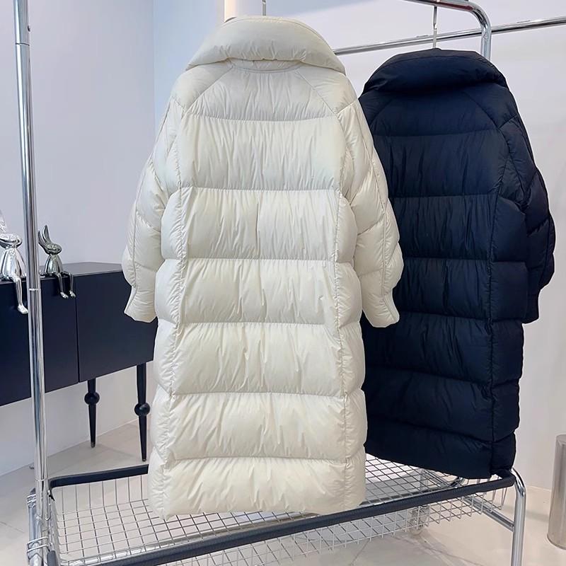 Doudoune longue femme 2024 hiver nouvelle mode épaissie bouffante sensation ample genou veste tendance grande taille
