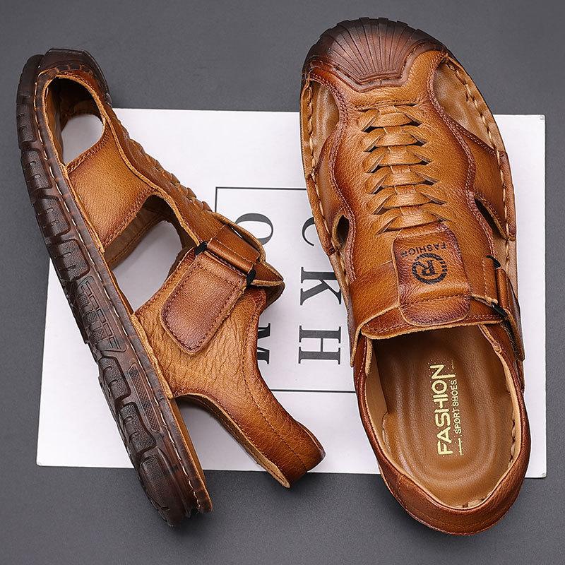 First layer cowhide sandals men's bag head summer wear casual beach shoes men's non-slip soft-soled hollow men's slippers