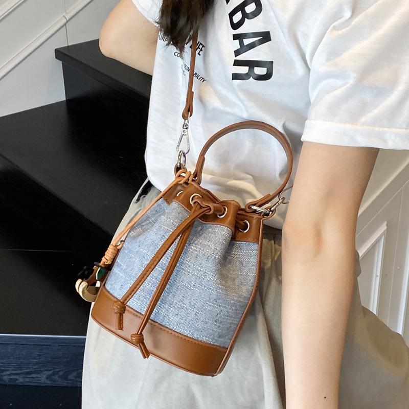Popular fashion bucket bag 2025 new trendy niche design single shoulder oblique bag high-end portable women's bag