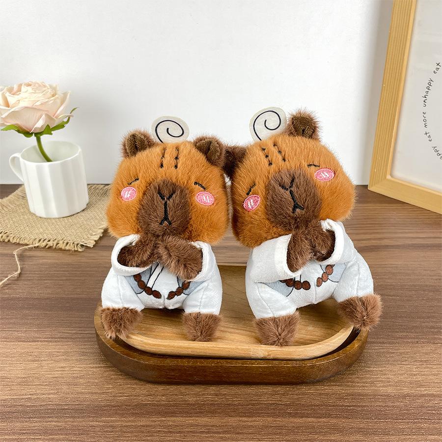 Buddhistische Wasserschwein Plüschpuppen Zen Kleidung Kapibara Puppen Taschen und Anhänger Bestreute und Gefangene Puppen