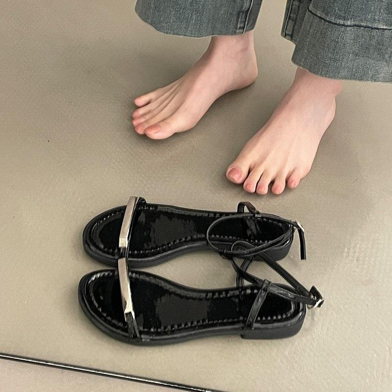 

French beautiful evening breeze with silver sandals women s summer 2025 new skirt high-end flat Roman shoes 35