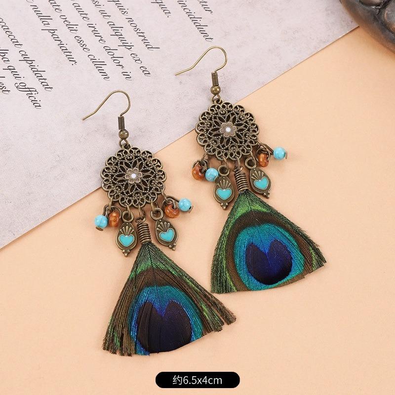 

Винтажные серьги с бахромой из павлиньих перьев Богемный нишевый дизайн Праздничные длинные серьги с темпераментом Женские