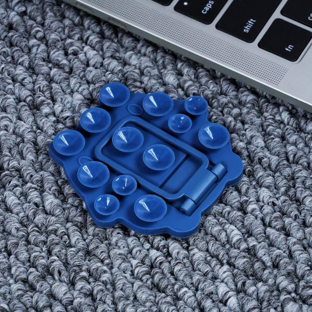Hexagonal silicone suction cup mobile phone holder, lazy artifact, portable magnetic suction multi-function universal folding desktop holder