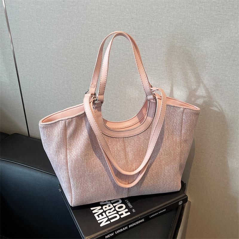 

Fashion commuter large-capacity bag women s new retro design shoulder bag versatile tote bag tide рожевий