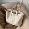 Die Tasche ist eine High-End-, exquisite, Nischen-, großvolumige Tasche, vielseitige große Pendlertasche, mit Textur für Damen, tragbare Tote Bag.