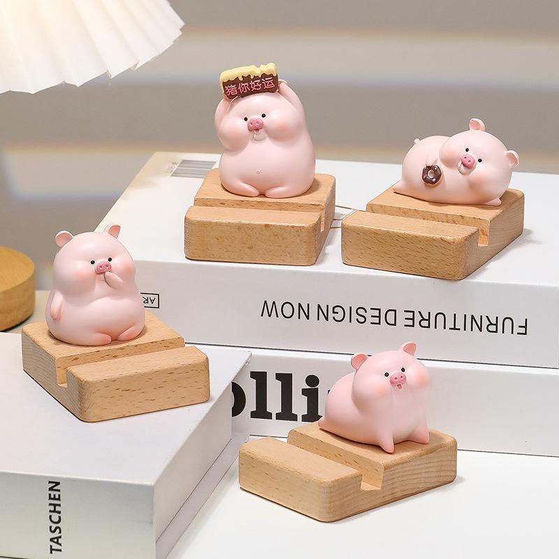 Mobile Phone Stand - Zhenan Zhenan, a Cute Resin Figurine for Home, Living Room, Tabletop Decoration. A Cute Pig-shaped Toy for Luxury Display.