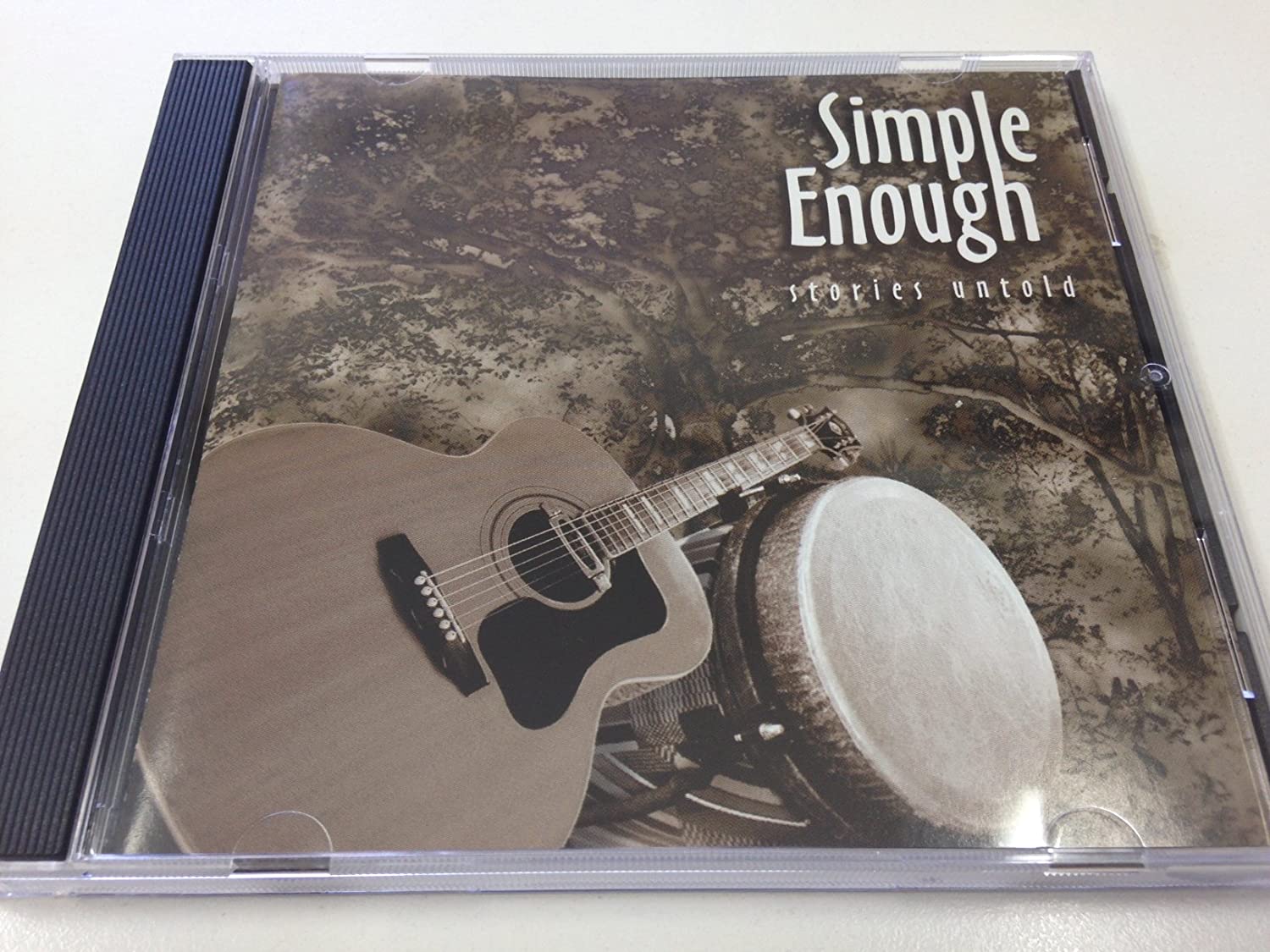 

CD SIMPLE ENOUGH - Stories Untold IGPD9806 Island Groove P 1998 US Music Others Used